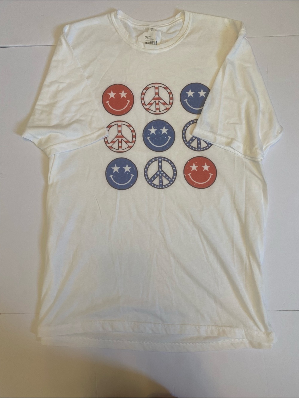 Next Level Apparel White Tee with Red & Blue Peace & Smile Icons